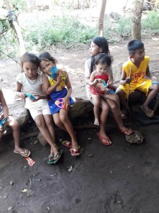 Children sitting down to eat